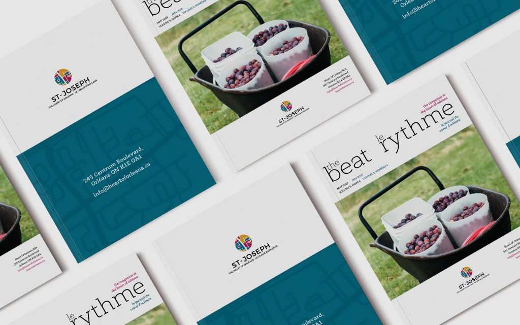 Photo showing several copies of The Beat le rhythme newsletter from the Heart of Orleans BIA