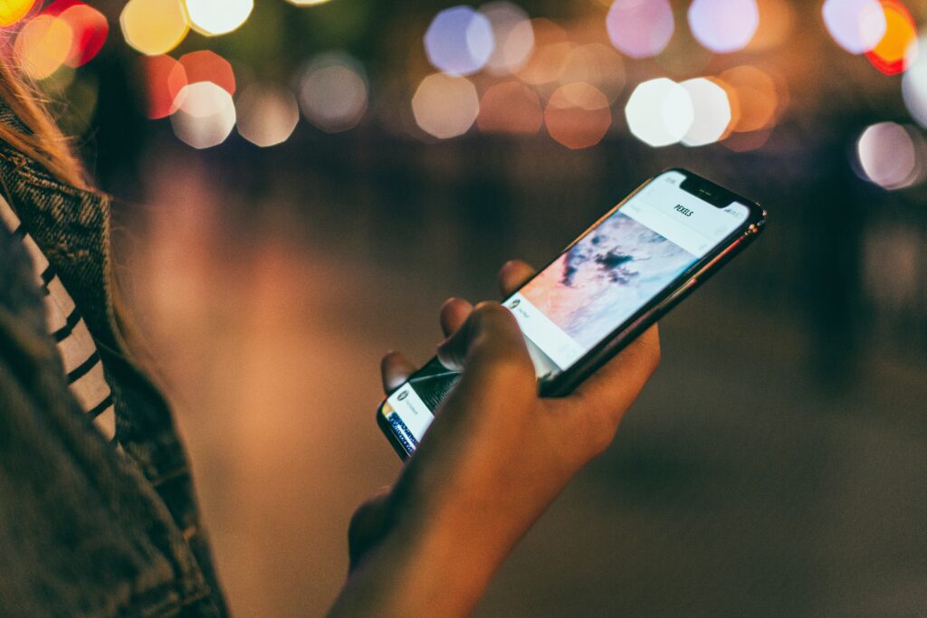 photo of a person holding a cell phone